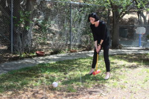 Our Program Director, Ronnie, demonstrating how to play the croquet game 